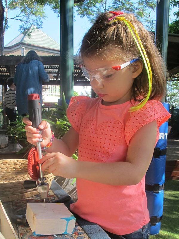 Working with wood at Red Hill Kindergarten.